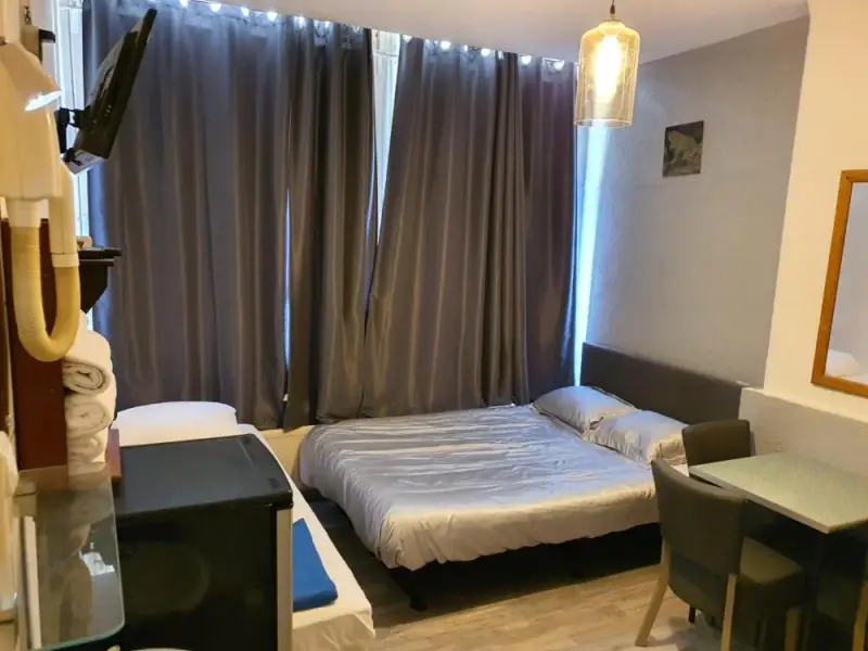 Triple Room with Shared Bathroom